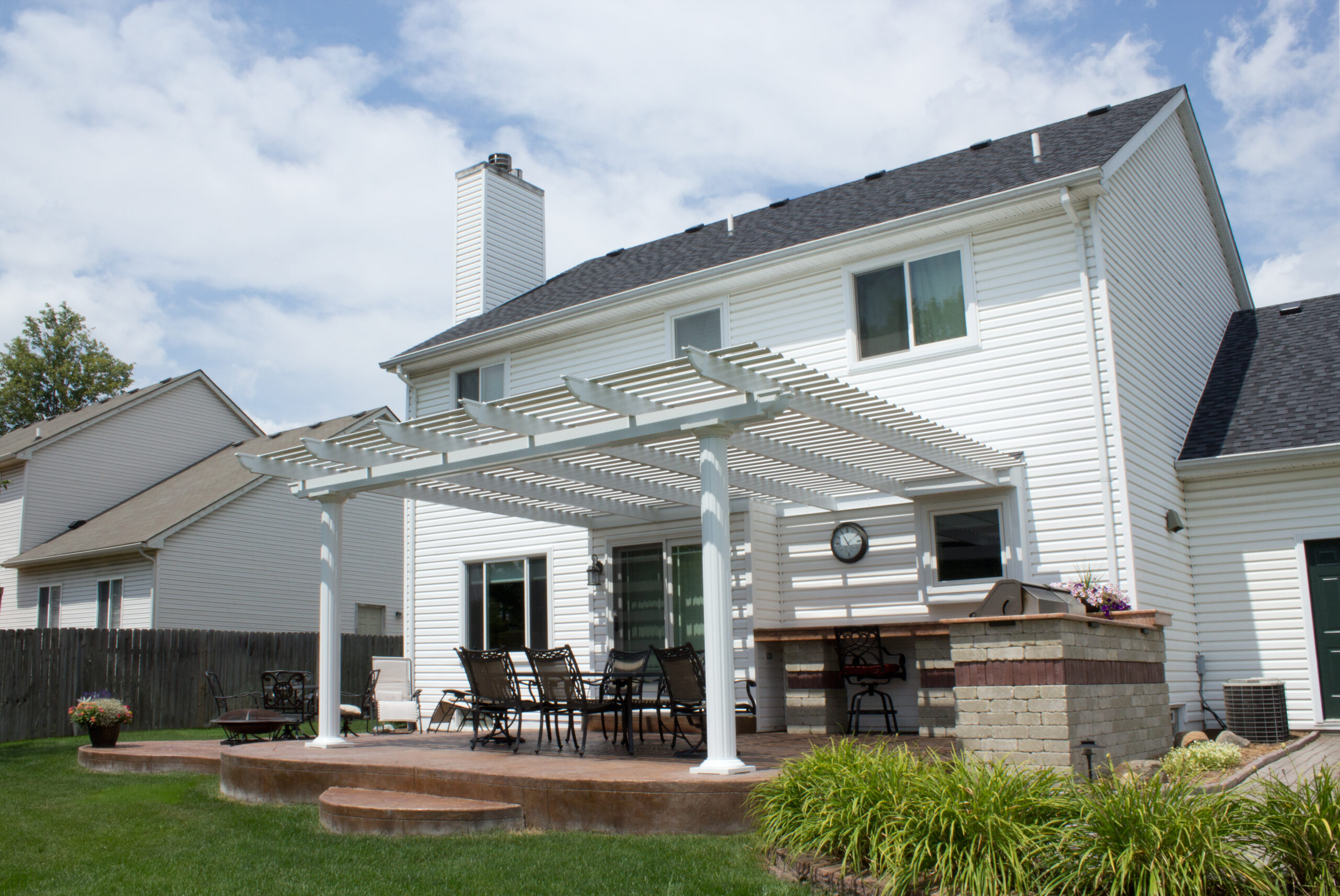 Poolside pergola providing shade