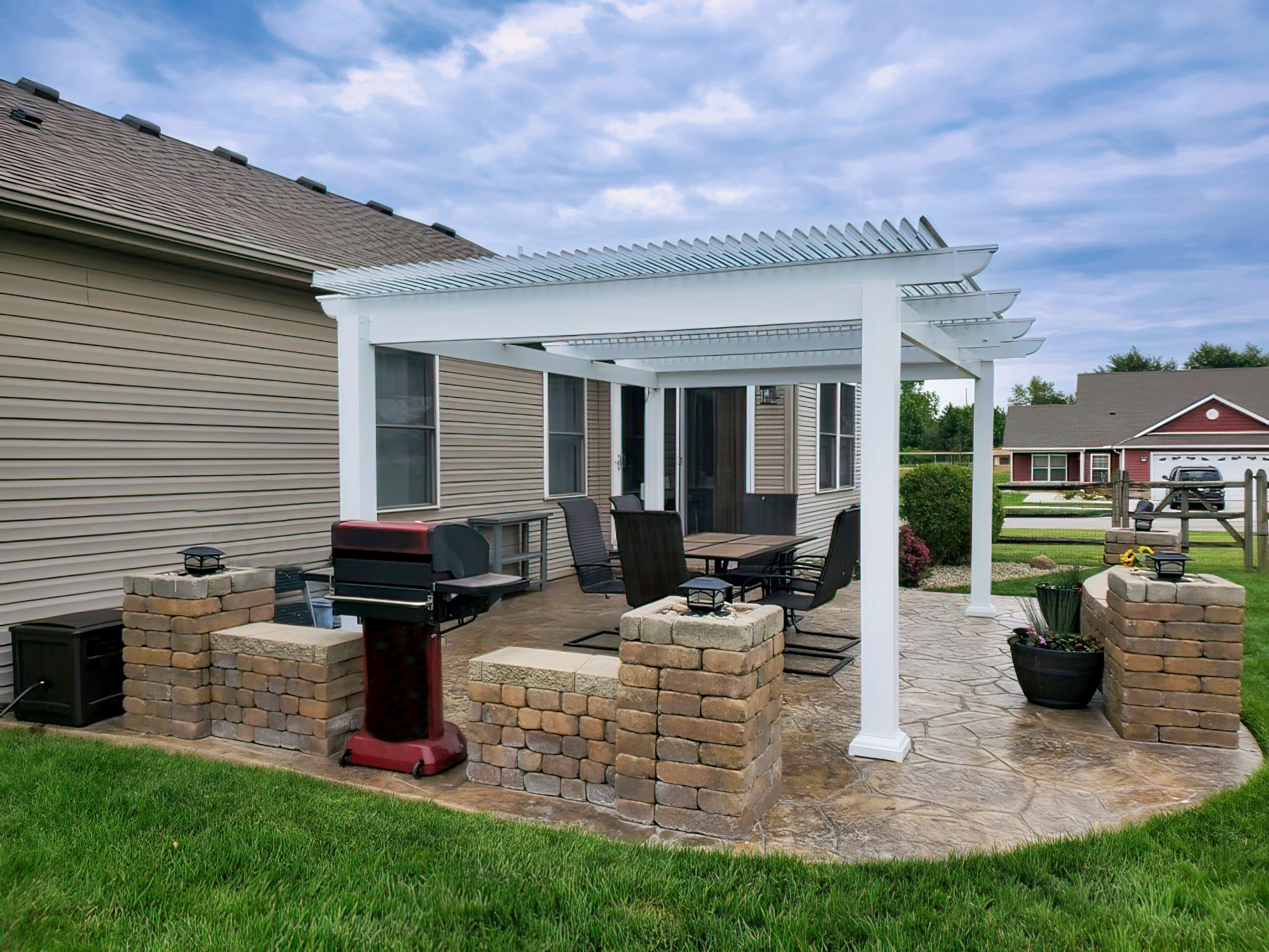 Wooden pergola over patio area